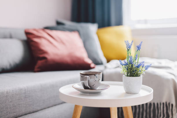 istock Coffee table in a small cozy apartment. 1398819570