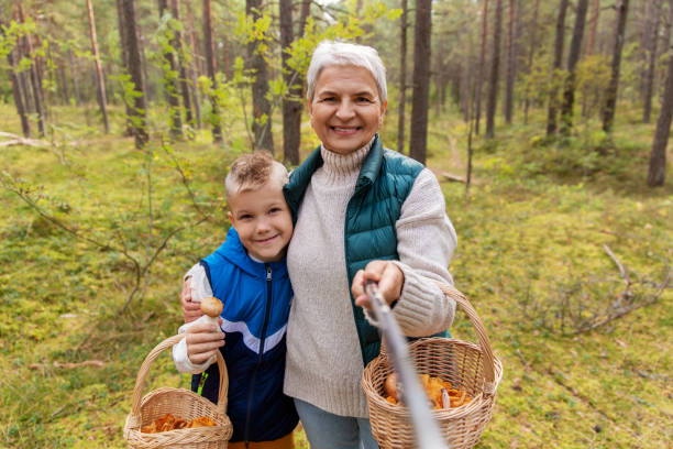istock grandmother and grandson with baskets take selfie 1398820910
