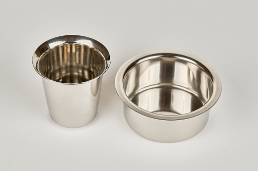 Steel dabarah and tumbler for filter coffee, on a white background