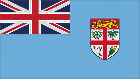 Fiji embroidery flag. Emblem stitched fabric. Embroidered coat of arms. Country symbol textile background.