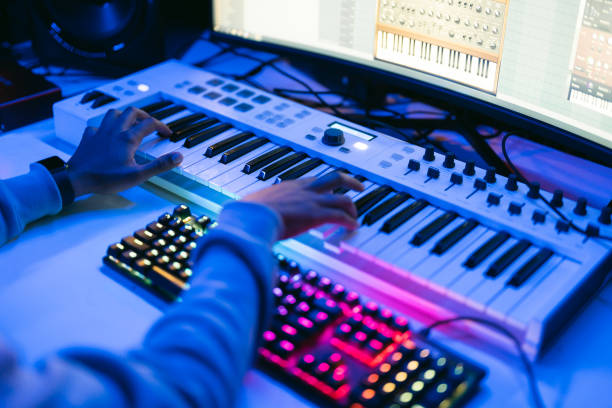 istock Close up sound producer hands working at studio 1398826309