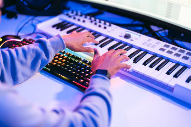 istock Close up sound producer hands working at studio 1398826345