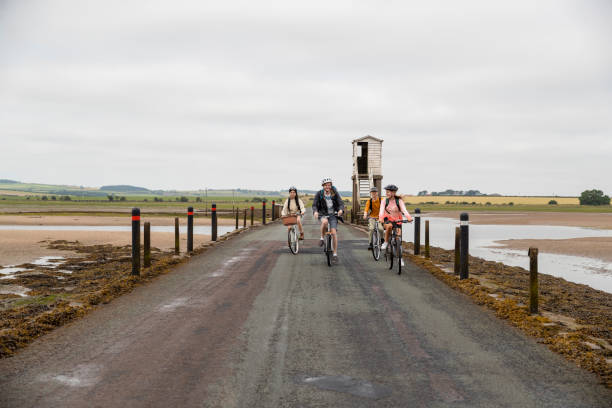 istock Riding Their Bikes Down the Road 1398830741