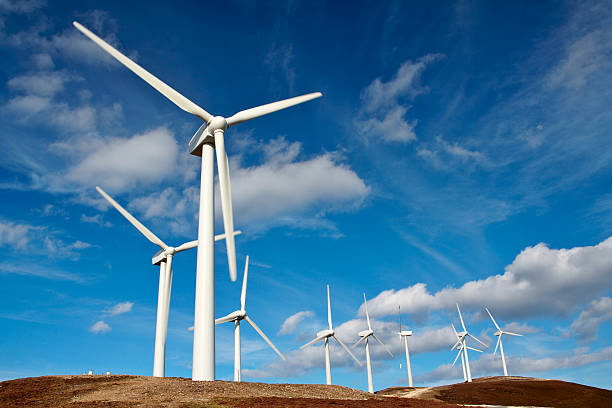 wind turbine farm - windenergie fotos stock-fotos und bilder