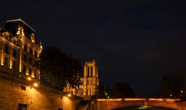 istock A night view of Cathedral Notre Dame de Paris 1398831293
