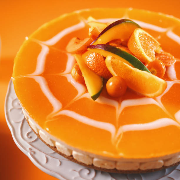 istock Creamy Orange Cheesecake with Whipped Cream 1398833572