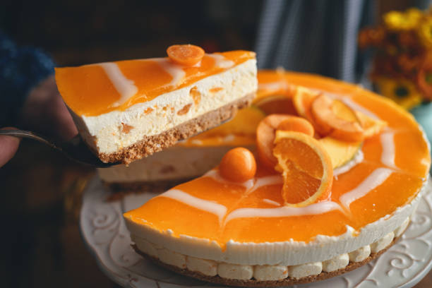 istock Creamy Orange Cheesecake with Whipped Cream 1398833603