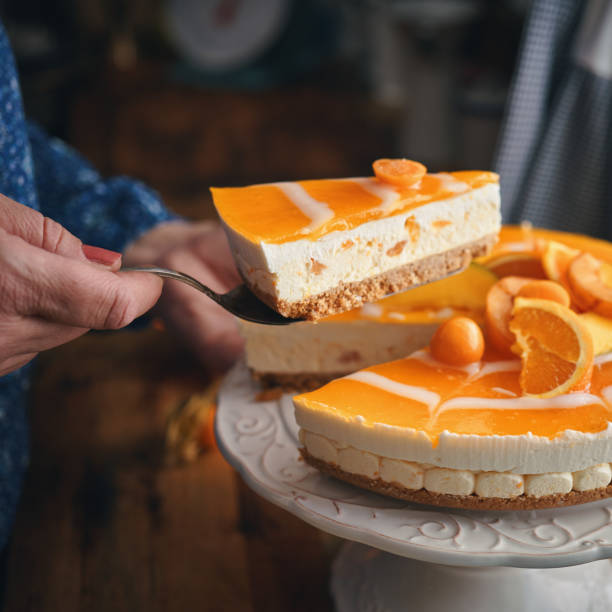 istock Creamy Orange Cheesecake with Whipped Cream 1398833606