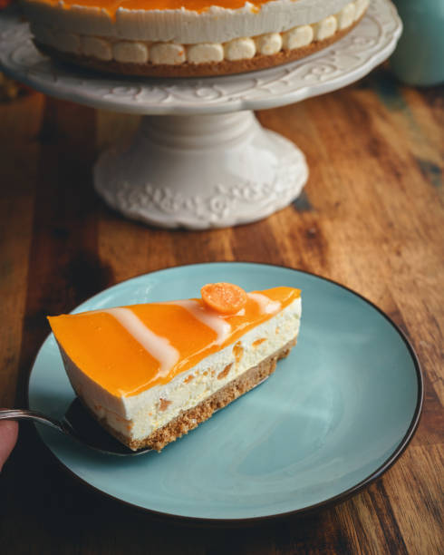 istock Creamy Orange Cheesecake with Whipped Cream 1398833615