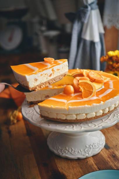 istock Creamy Orange Cheesecake with Whipped Cream 1398833618