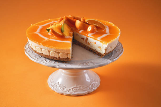 istock Creamy Orange Cheesecake with Whipped Cream 1398834083