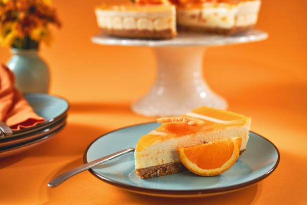 istock Creamy Orange Cheesecake with Whipped Cream 1398834127