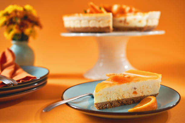 istock Creamy Orange Cheesecake with Whipped Cream 1398834129