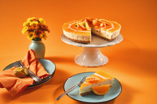 istock Creamy Orange Cheesecake with Whipped Cream 1398834136