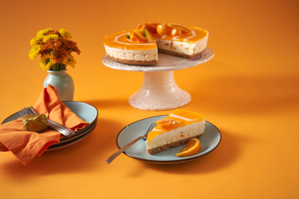 istock Creamy Orange Cheesecake with Whipped Cream 1398834139