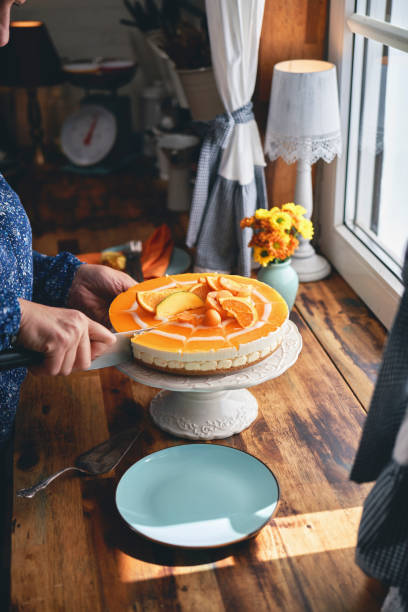 istock Creamy Orange Cheesecake with Whipped Cream 1398834149