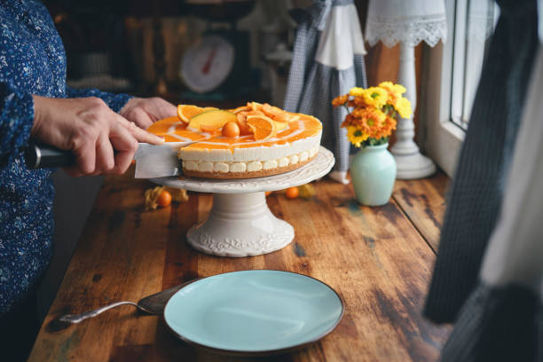 istock Creamy Orange Cheesecake with Whipped Cream 1398834151