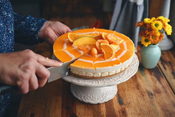 istock Creamy Orange Cheesecake with Whipped Cream 1398834156