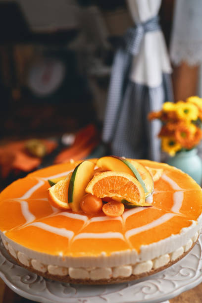 istock Creamy Orange Cheesecake with Whipped Cream 1398834426