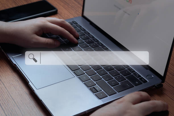 istock Woman use laptop for searching online. 1398834691