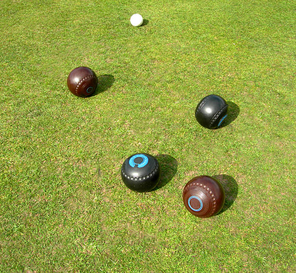 istock Two Brown  2 Black Lawn Bowls 139883479