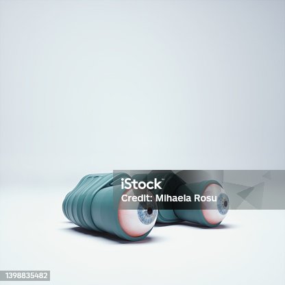 istock Binoculars with eyes reaching out. 1398835482