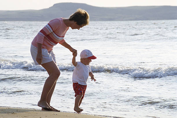 istock Mother and child on a beach 139883574