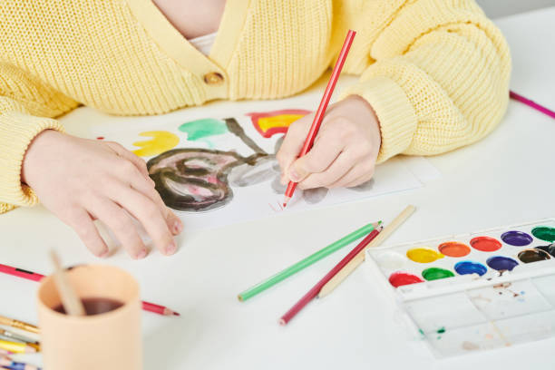 istock Unrecognizable Girl Drawing Picture 1398836922