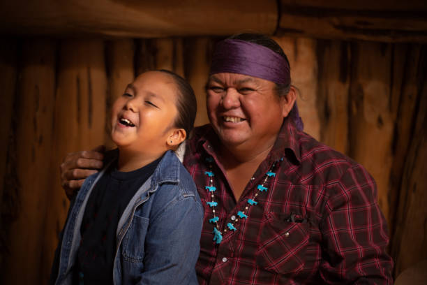 istock Father and son g joking around - candid fun moment 1398839480
