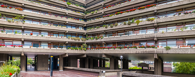 The flower filled balconies of the flats in the Barbican estate, London.