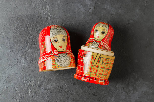istock A red matryoshka doll on a black background. Traditional Russian toy. 1398843500
