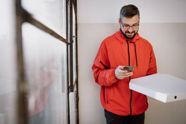 istock Food delivery man 1398845529