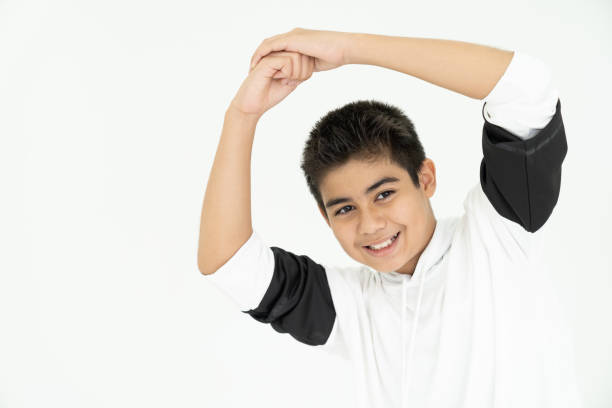 Asian boy show dancing in dance center on white background