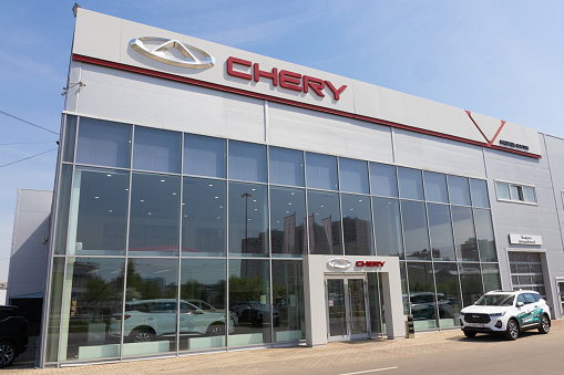 Krasnoyarsk, Russia - May 19, 2022: Chery dealership store. Showroom of a brand. Chinese state-owned automobile manufacturer