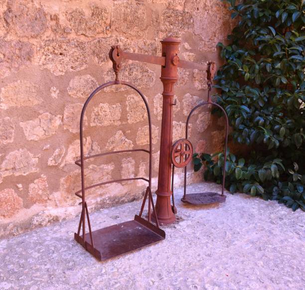 istock Old iron scale to weigh goods. 1398850230