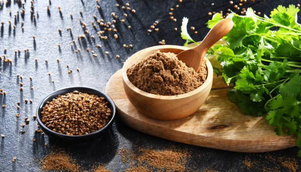 istock Ground coriander, its dried seeds and fresh leaves 1398851266