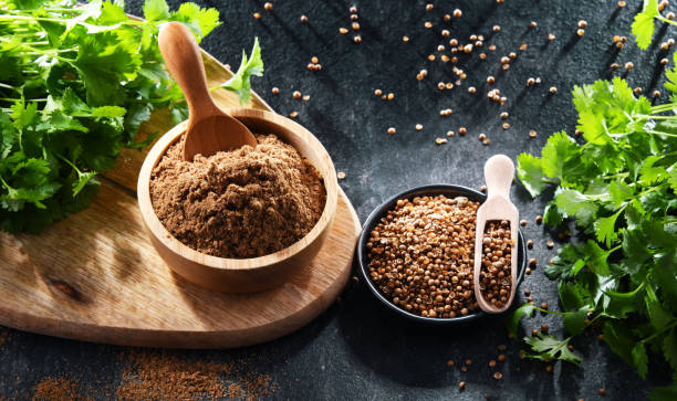 istock Ground coriander, its dried seeds and fresh leaves 1398851281
