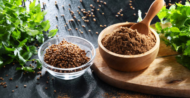 istock Ground coriander, its dried seeds and fresh leaves 1398851302