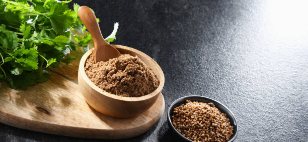istock Ground coriander, its dried seeds and fresh leaves 1398851323