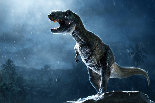 istock Dinosaur tyrannosaurus rex on top mountain 1398851511