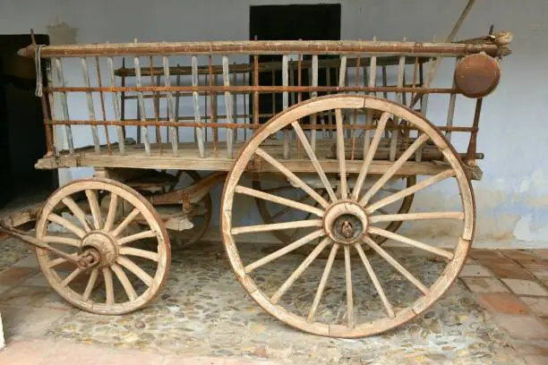 Photo of Antique four-wheeled cavalry wagon or trailer.