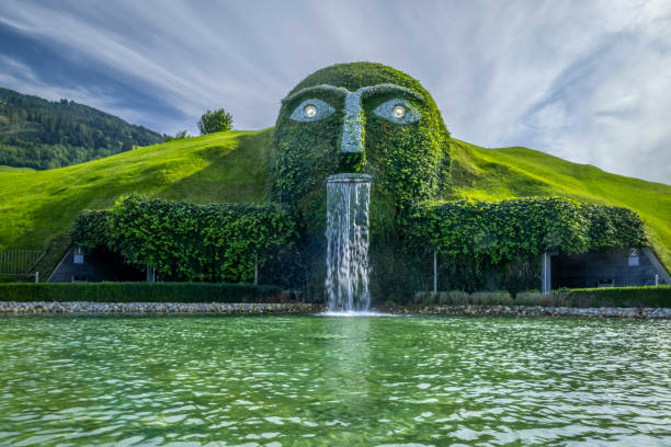 Swarovski Crystal Worlds, Wattens, Austria Swarovski Crystal Worlds, entry under the waterfall of the head of the Giant, Wattens Tyrol, Austria, Europe park designer label stock pictures, royalty-free photos & images