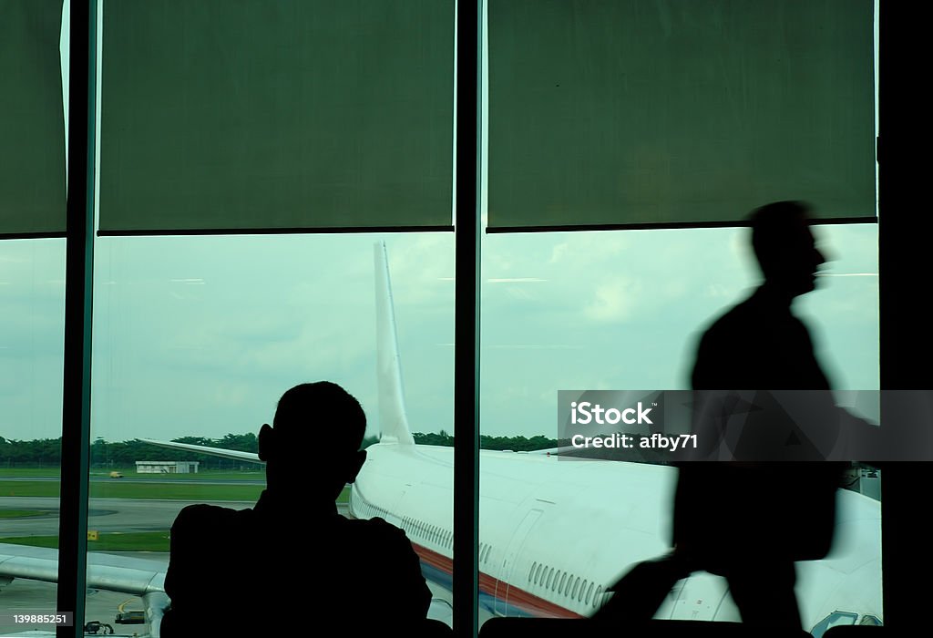 motion blur of a traveller motion and stationary traveller Window Blinds Stock Photo