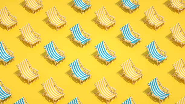 istock Beach chair minimal summer concept yellow background 1398855538