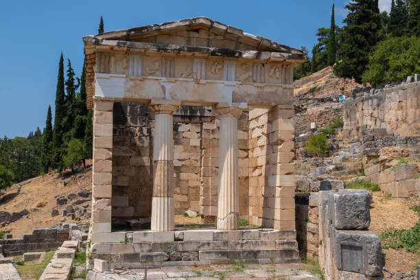 istock Athenian Treasury in Delphi, an archaeological site in Greece, at the Mount Parnassus. Delphi is famous by the oracle at the sanctuary dedicated to Apollo. UNESCO World heritage 1398856531