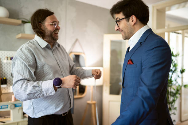 istock Male customer having a suit rehearsal at the tailor workshop 1398861846