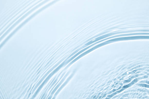 istock The texture of water on a blue background. 1398861880
