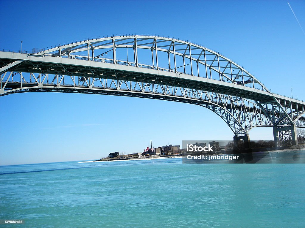 Bridge to Canada Color photo of blue water bridges from America to Canada Blue Stock Photo