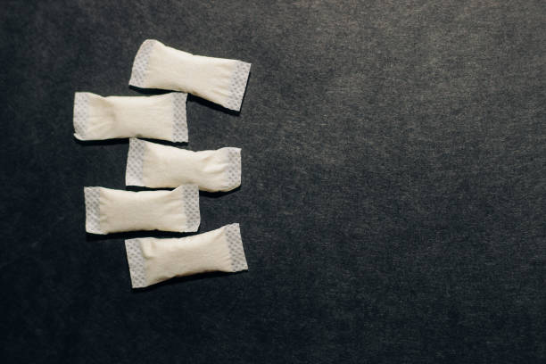istock Nicotine snus spiders, tobacco pads, quit smoking concept 1398866031