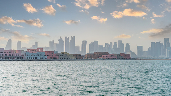 Doha skyline with many towers during a summer day.